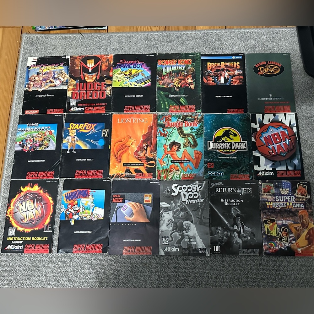 18 Super Nintendo manuals and Donkey Kong Country Quest Guide